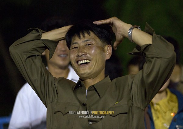 North Korean man coming down from a roller coaster in Kaeson youth park, Pyongan Province, Pyongyang, North Korea