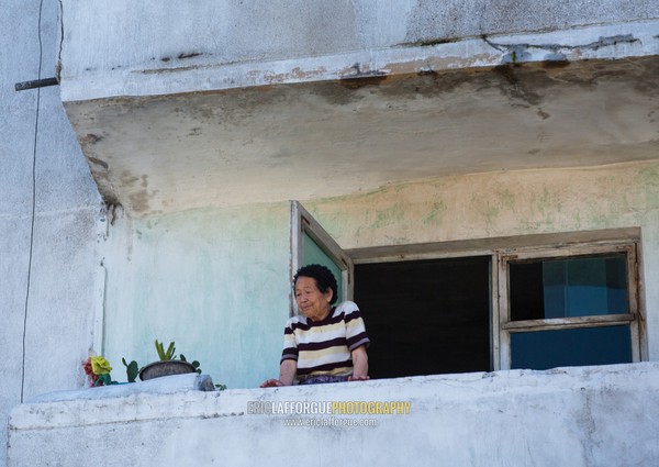 North Korean woman on her balcony, Kangwon Province, Wonsan, North Korea