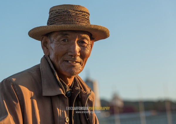 Portrait of a North Korean man with a hat, Kangwon Province, Wonsan, North Korea