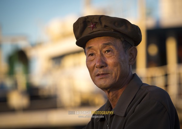 Portrait of a North Korean man with a cap, Kangwon Province, Wonsan, North Korea