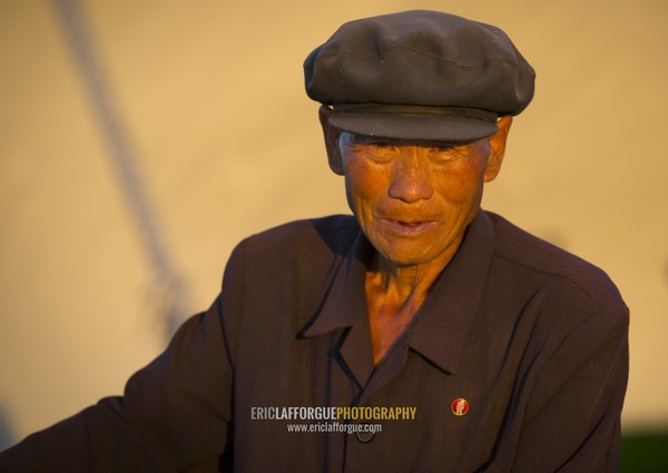 Portrait of a North Korean man with a cap, Kangwon Province, Wonsan, North Korea