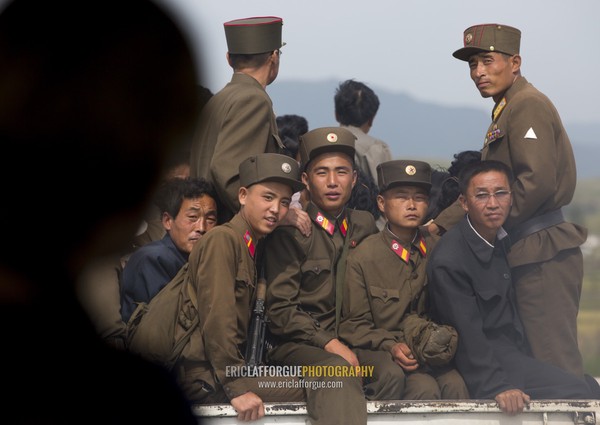 North Korean soldiers sit in the back of a truck, South Hamgyong Province, Hamhung, North Korea