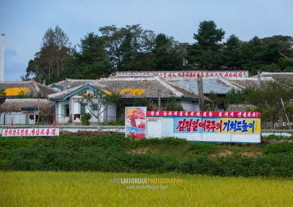 Propaganda billboards in a village, South Hamgyong Province, Hamhung, North Korea