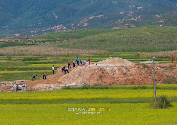 Norh Korean workers in a field, South Hamgyong Province, Hamhung, North Korea