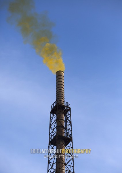 Yellow smoke coming out of a chimney in Hungnam nitrogen fertilizer plant, South Hamgyong Province, Hamhung, North Korea