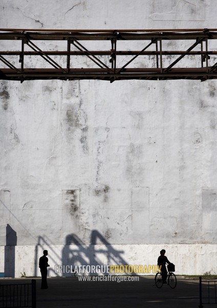 North Korean people riding bicycles in Hungnam nitrogen fertilizer plant, South Hamgyong Province, Hamhung, North Korea