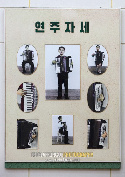 Accordion lesson poster in Mangyongdae children's palace, Pyongan Province, Pyongyang, North Korea