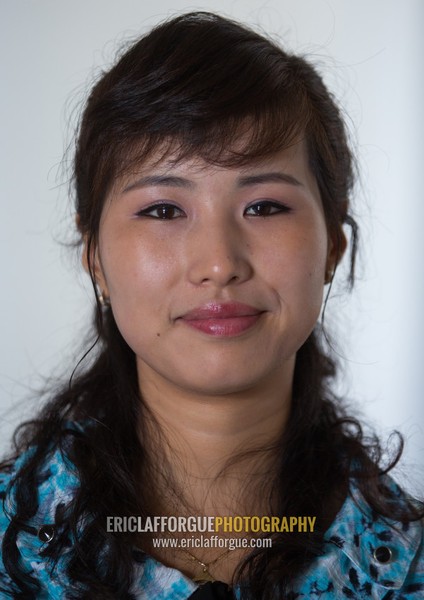 Portrait of a smiling North Korean woman guide, Pyongan Province, Pyongyang, North Korea