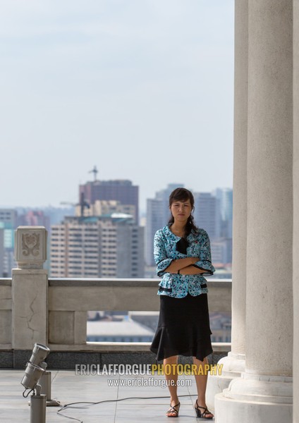 North Korean woman on the terrace of the Grand people's study house, Pyongan Province, Pyongyang, North Korea