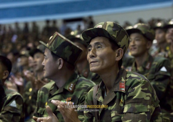 North Korean soldiers enjoying the show in Rungna dolphinarium, Pyongan Province, Pyongyang, North Korea