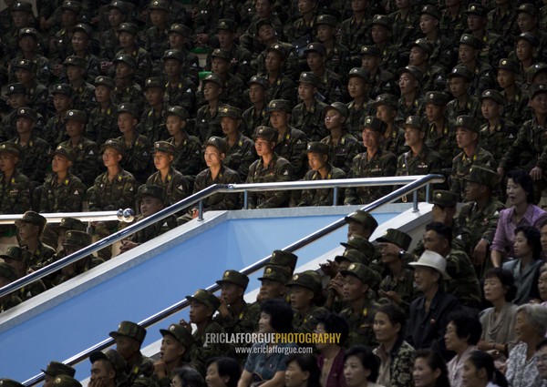 North Korean soldiers enjoying the show in Rungna dolphinarium, Pyongan Province, Pyongyang, North Korea