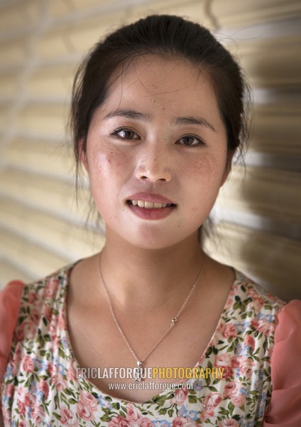 Portrait of a North Korean waitress in a restaurant, Pyongan Province, Pyongyang, North Korea