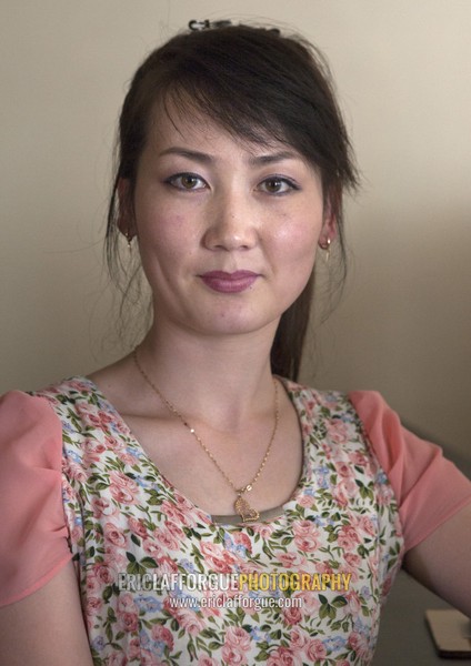 Portrait of a North Korean waitress in a restaurant, Pyongan Province, Pyongyang, North Korea