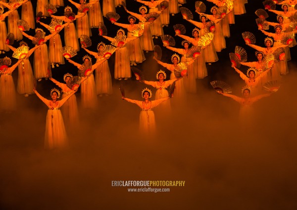 North Korean women dancing in choson-ot during the Arirang mass games in may day stadium, Pyongan Province, Pyongyang, North Korea