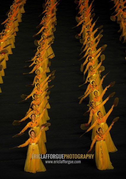 North Korean women dancing in choson-ot during the Arirang mass games in may day stadium, Pyongan Province, Pyongyang, North Korea