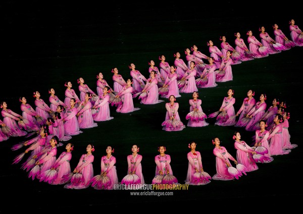 North Korean women dancing in choson-ot during the Arirang mass games in may day stadium, Pyongan Province, Pyongyang, North Korea