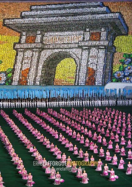 Arch of triumph made by children pixels holding up colored boards during Arirang mass games in may day stadium, Pyongan Province, Pyongyang, North Korea