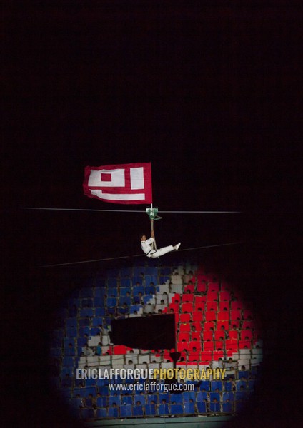 North Korean man cossing the sky during the Arirang mass games in may day stadium, Pyongan Province, Pyongyang, North Korea