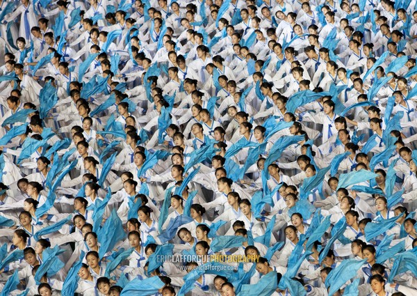 North Korean women dancing in choson-ot during the Arirang mass games in may day stadium, Pyongan Province, Pyongyang, North Korea